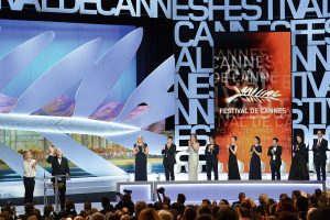 French director and President of the Camera d'Or Jury Nicole Garcia (L) and the President of the Cannes Film Festival Gilles Jacob stand on stage during the closing ceremony of the 67th edition of the Cannes Film Festival in Cannes, southern France, on May 24, 2014.   AFP PHOTO / ALBERTO PIZZOLI