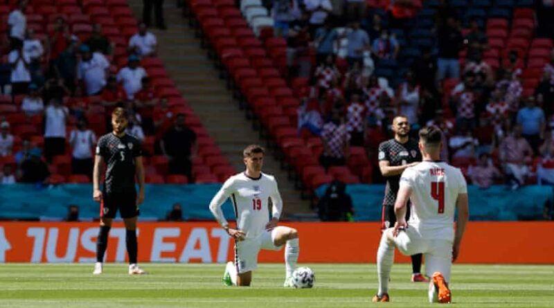 England’s Mason Mount and Declan Rice take the knee before kick-off at Wembley. Photograph: Tom Jenkins/The Guardian