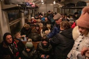 Families with children inside the train to Przemyśl in Poland_2
